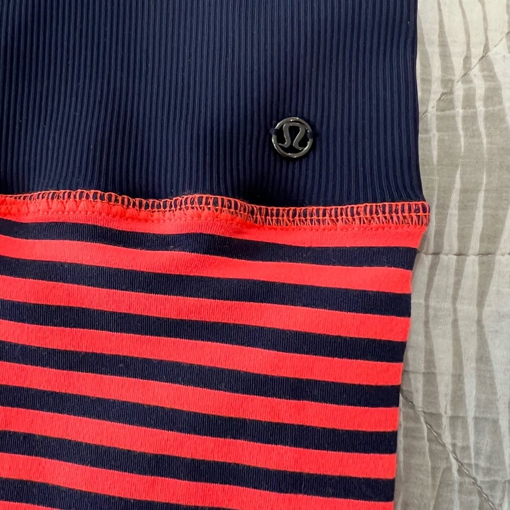 Lululemon leg warmers, navy and orange, never worn. One size fits most.